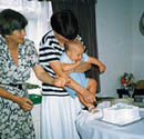 Elizabeth with daughter Charlotte and Thomas's first birthday